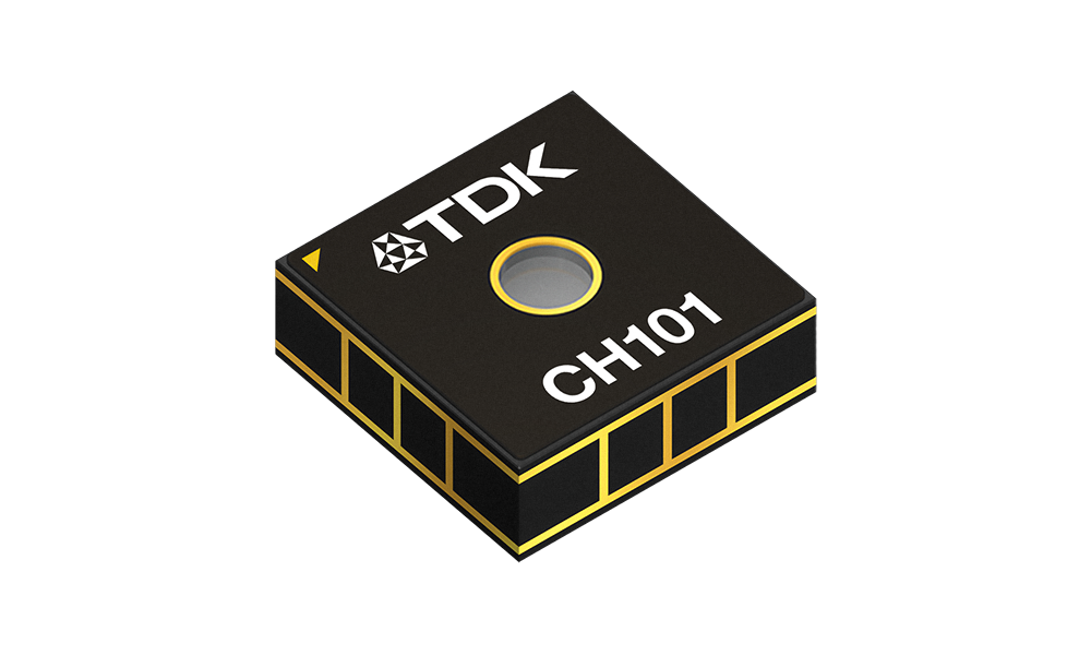 Microchip with TDK logo and "CH101" etched onto its surface