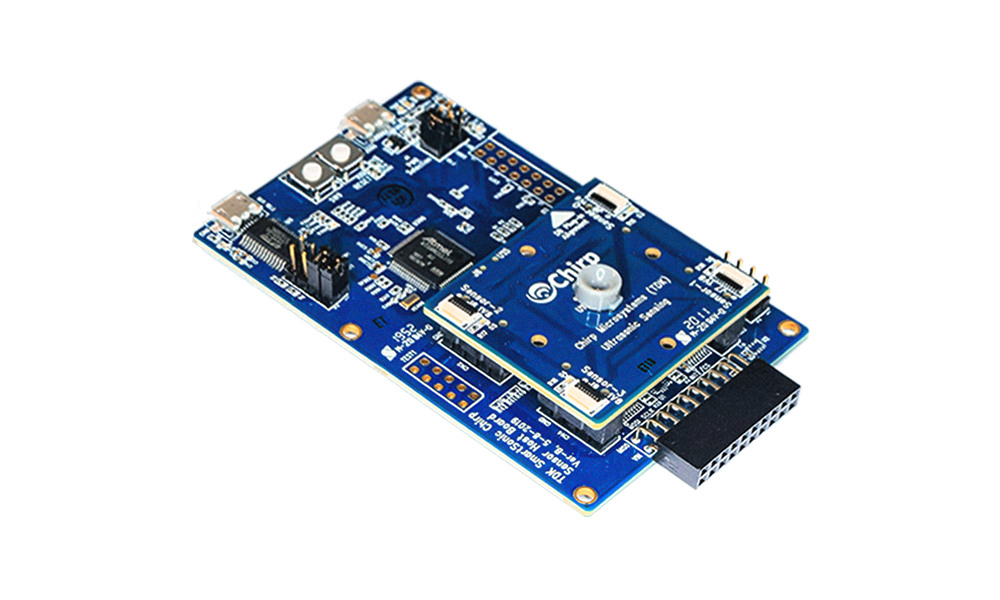 DK-CH201: Two PCBs stacked together with many small chips and components attached to them