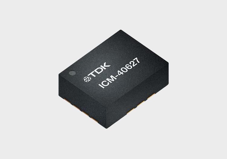 Microchip with TDK logo and "ICM-40627" etched onto its surface